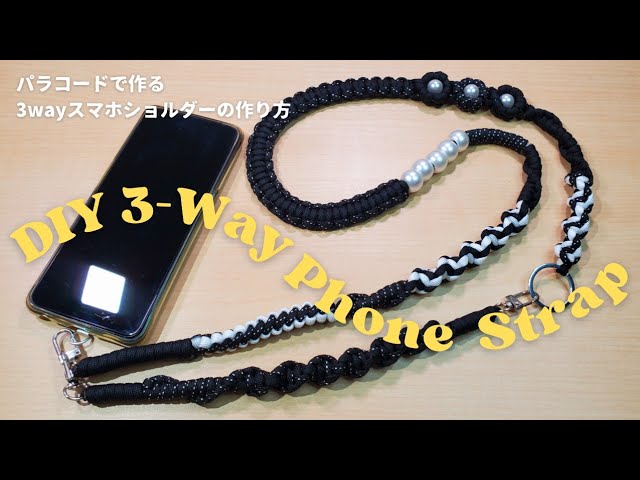 ハンドメイド パラコード スマホショルダー ブラック×リボン 花柄とカラフルなデザインのスマホ